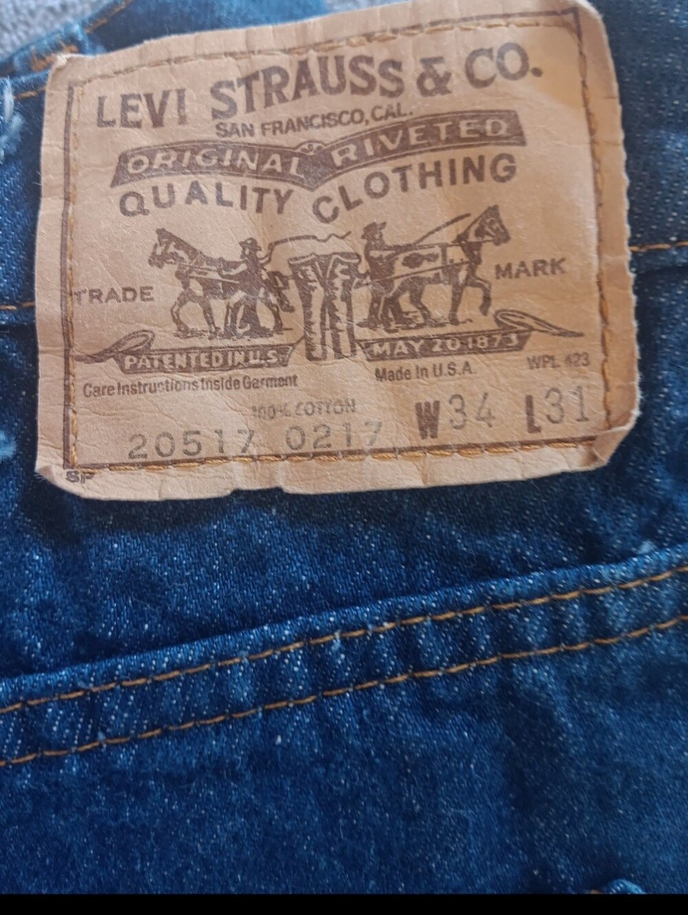Women's Blue Denim Jeans with Decorative Button